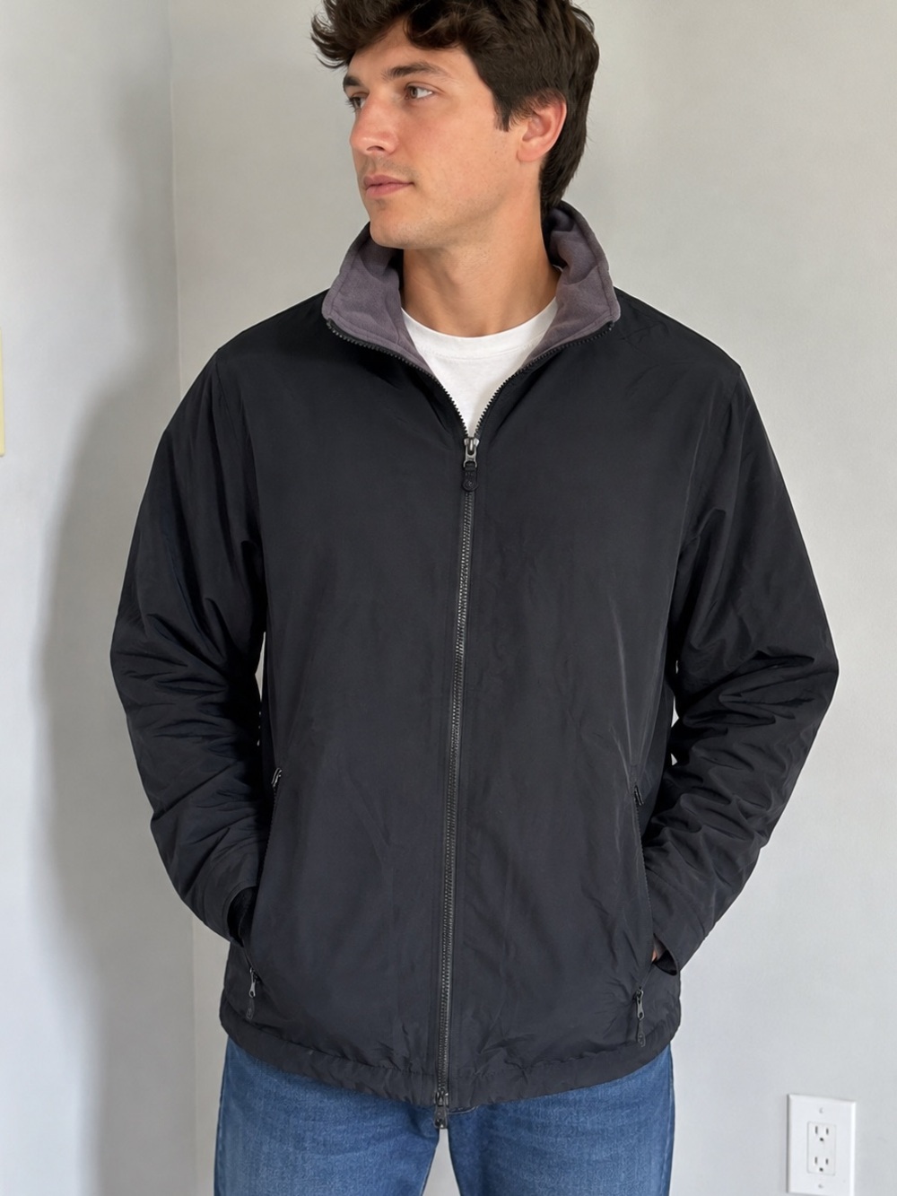 Devon & Jones black lightweight jacket in size Medium. Features a full front zip
